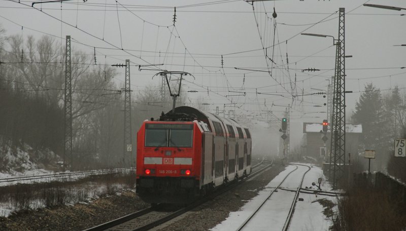 146 206-8 schiebt ihren RE Ulm-Stuttgart durch den Bahnhof Westerstetten. Aufgenommen am 24.01.10.