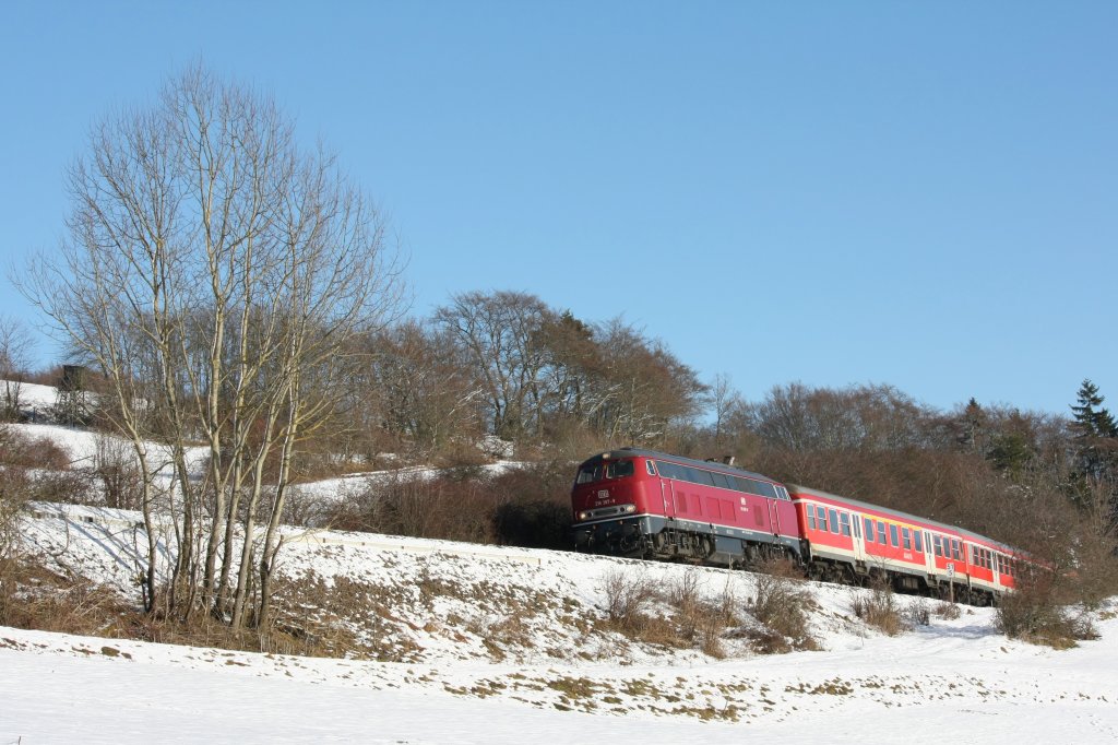Die 218 387-9 fuhr am 30.01.2011 durch Neerdar, nahe Usseln.