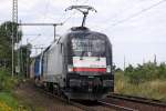 mrce-mitsui-rail-capital-europe/55532/es-64-u2-061-182-561-1-mit ES 64 U2-061 (182 561-1 mit einer unbekannten MaK G2000 in Kln Wahn am 27,07,09