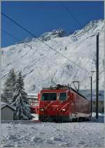 Eine MGB HGe 4/4 verlsst mit dem Glacier Express Andermatt Richtung Oberalppass.