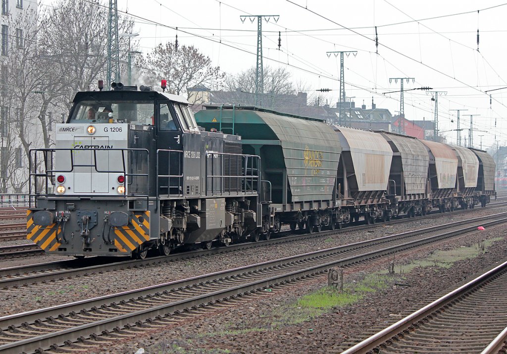 MRCE/Captrain G1206 mit kurzem Getreidezug in Kln West am 16.03.2011