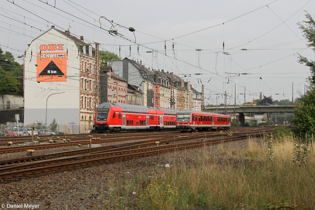 Der RE7 und RB47 (628 509) in Wuppertal Oberbarmen am 25.09.2013 