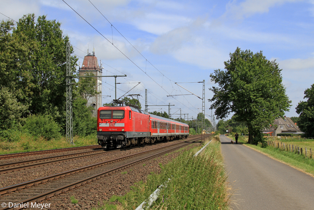 Die 112 154-0 in Brokstedt am 19.07.2013