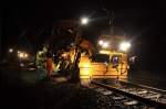 Zu den Letzten Arbeiten auf der Strecke zwischen Duisburg und Ratingen in hhe Lintorf kamen noch der Stopfer und der Besen zum Einsatz. Aufgenommen am 11.01.2011. Leider hatte ich kein Stativ zur Verfgung
