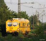 Am 12.07.2010 kam die Plasser & Theuser EM-SAT 120 der DB-Netz durch Mainz-Bischofsheim.