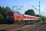 218 374-7 mit dem Kreuzfahrerverstäker Hamburg Hbf-Kiel Hbf am 1.8.11 bei der Ausfahrt von Wrist