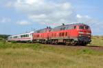 218 321-8 und 218 xxx-x fahren am 5.8.11 von der Insel Sylt auf den Damm