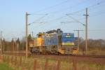 MWB V2103 mit einer weiteren G1206 im Schlepp Richtung Sden am 13.1.12 bei Quarnstedt