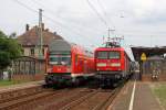 Die RB 14 nach Senftenberg neben der 112 183 mit dem RE nach Berlin Hbf in Calau (Niederl) am 17,08,11