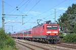 143 869-9 mit der RB nach Hamburg-Altona bei der Einfahrt in den Bahnhof Wrist