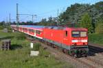 143 557-7 mit der RB von Neumnster nach Hamburg-Altona am 1.8.11 bei der Einfahrt in den Bahnhof Wrist