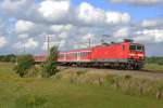 143 805-0 mit der RB Flensburg-Neumnster am 4.8.11 inder Nhe von Jagel