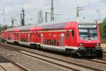 Die 143 009-9 schiebt die RB27 von Kln Hbf nach koblenz durch Kln Messe/Deutz am 18.07.2010