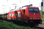 Die 185 588-1 der HGK im ersten Morgenlichtauf dem Weg durch Lintorf am 18.04.2011
