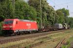 Ein Schwerer Zug. Die Railion - DB Logistics 185 287-0 mit einem Trafo in Lintorf am 26.04.2011