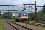 Am 4.8.11 bespannte 242.516 Ferdinand einen Gterzug Richtung Sden in Padborg